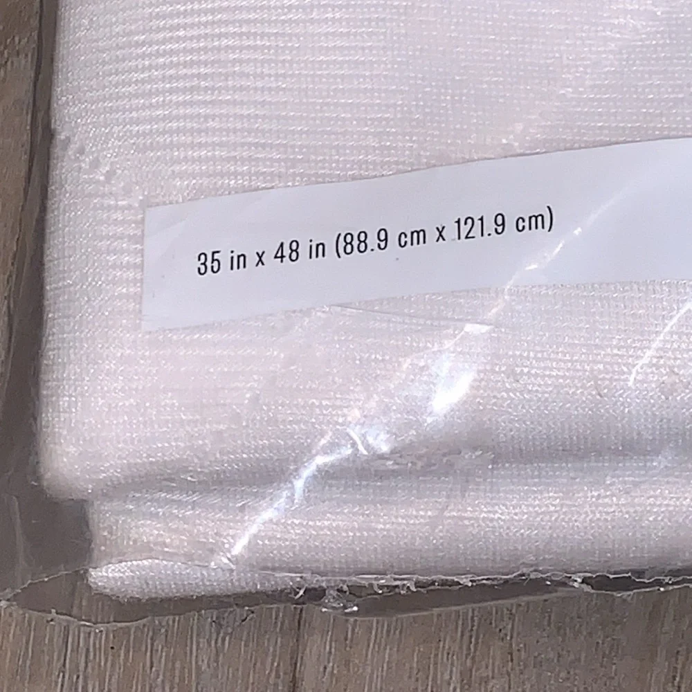 Room Essential Underpad. Certified Standard 100 by Oeko-Tex.